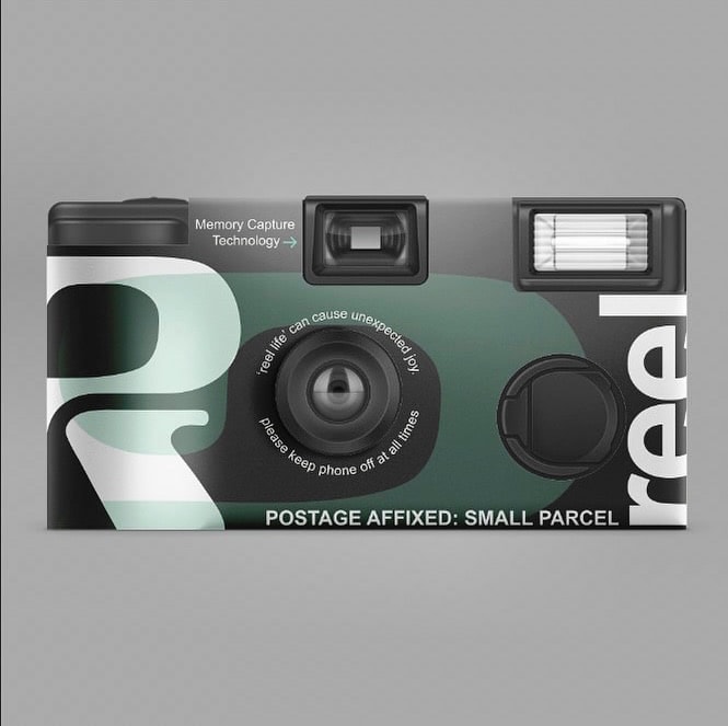 The Reel Cameras disposable camera in its printed sleeve